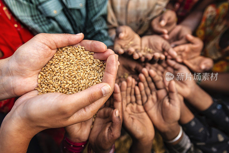 Poor Indian children asking for food, India